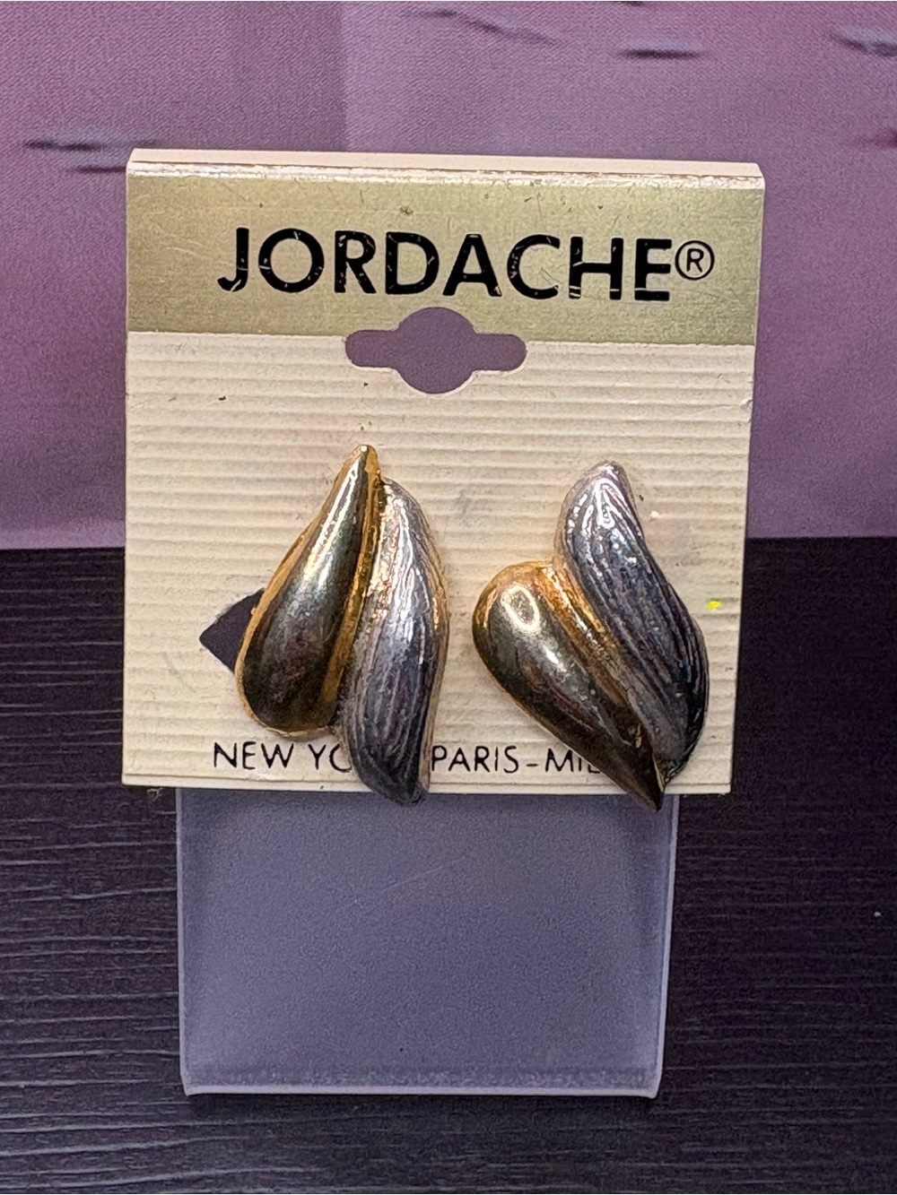 Vintage Jordache earrings two tone curved leaf. New Old Stock.